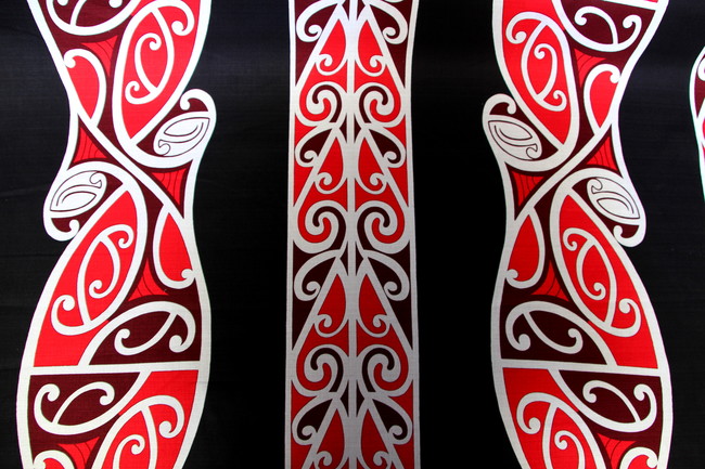 * REMNANT - Red & White on Black Traditional Maori Design Printed Dobby