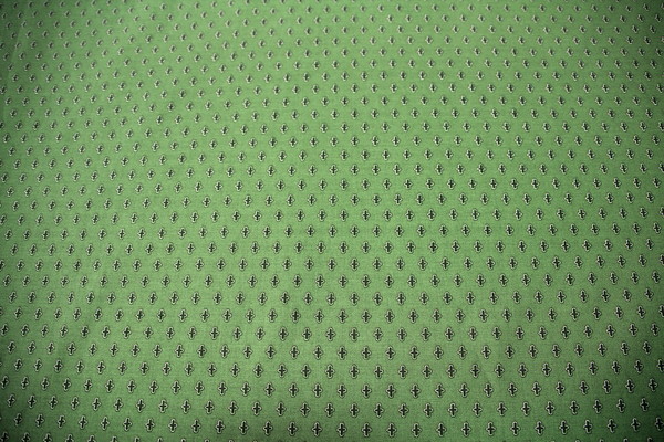 Soft Edged Crosses on Green Printed Cotton