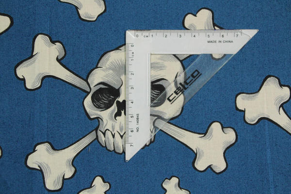 Skull & Cross Bones on Blue Printed Cotton