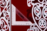 White & Black on Burgandy Traditional Designs of Aotearoa