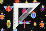 Bright Bugs on Black Cotton
