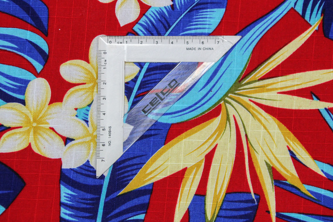 Frangipani & Blue Leaves on Red Textured Printed Cotton