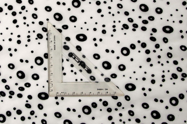 Black Flocked Circles on White Printed Polyester